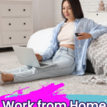 A woman sits on a carpeted floor, leaning against a couch with her laptop and wine glass. Dressed in a casual shirt and jeans, she embodies the essence of Work from Home Careers. In the background, a bed and nightstand add to the cozy ambiance. Visit scwbehindthescenes.com for more insights.