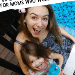 A smiling woman sits by a pool with a laptop on her lap, holding a young girl who is sticking out her tongue and holding a blue stuffed animal. Text reads: Work-life balance for moms who work remotely.