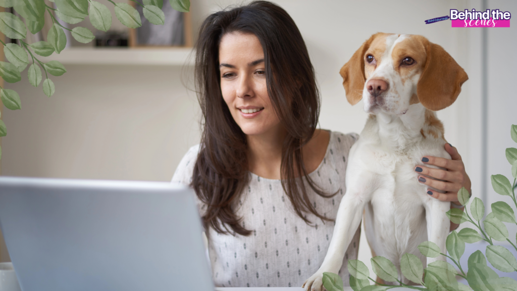 A woman smiles at a laptop while holding a brown and white dog beside her. Green leaves frame the image, and a “Behind the Scenes” label appears in the top right corner.